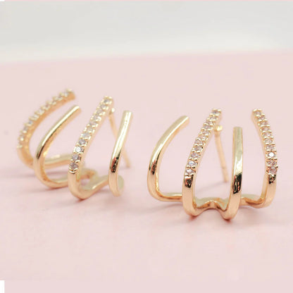 ✨ Aretes 4 en 1 Claw - Enchapados en Oro 14K ✨